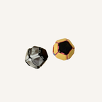 Handheld spring fidget designed for repetitive pressing and satisfying pop movement.