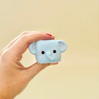 Official TABASQUISHY® cube-shaped squishy with animal design, soft texture and collectible desk toy appeal
