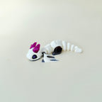 Winged dragon fidget with smooth links and gentle texture for repetitive motion and focus; collectable, limited edition.
