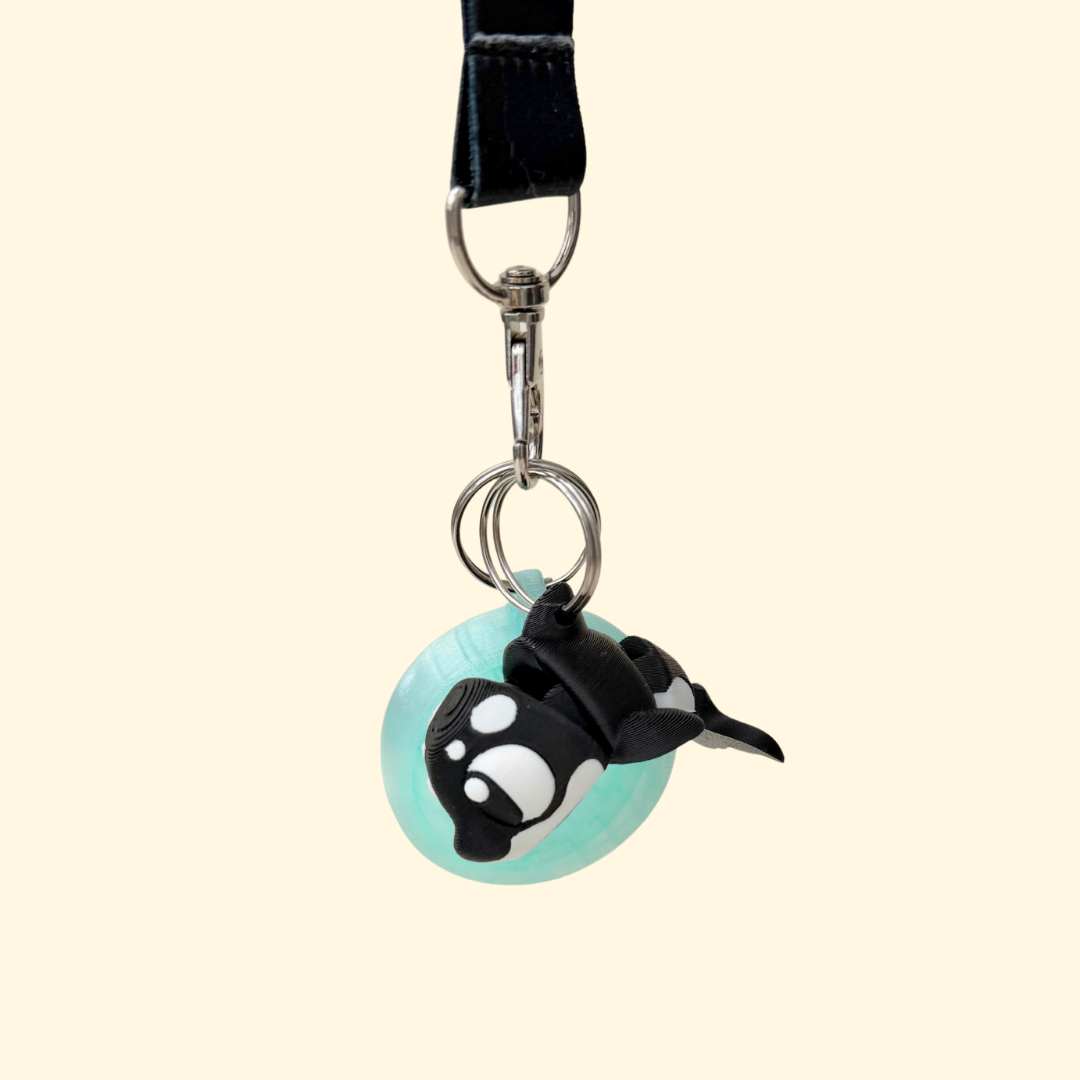 Lightweight orca charm-style stim tool for neurodivergent routines, gentle handling and quiet focus.
