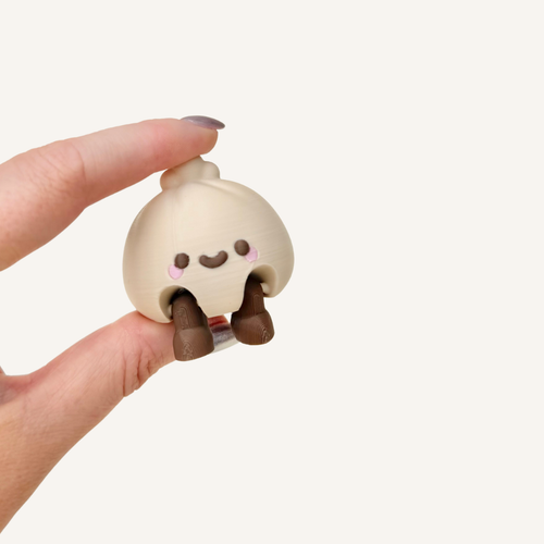 Small smiley baozi collectable made for neuro-friendly workspaces, cosy corners and everyday display
