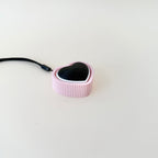 A modern and practical fidget toy with a heart shape and pop-click mechanism.