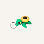 Cute turtle lanyard attachment with sunflower detail, gentle movement and tactile texture for everyday sensory support.