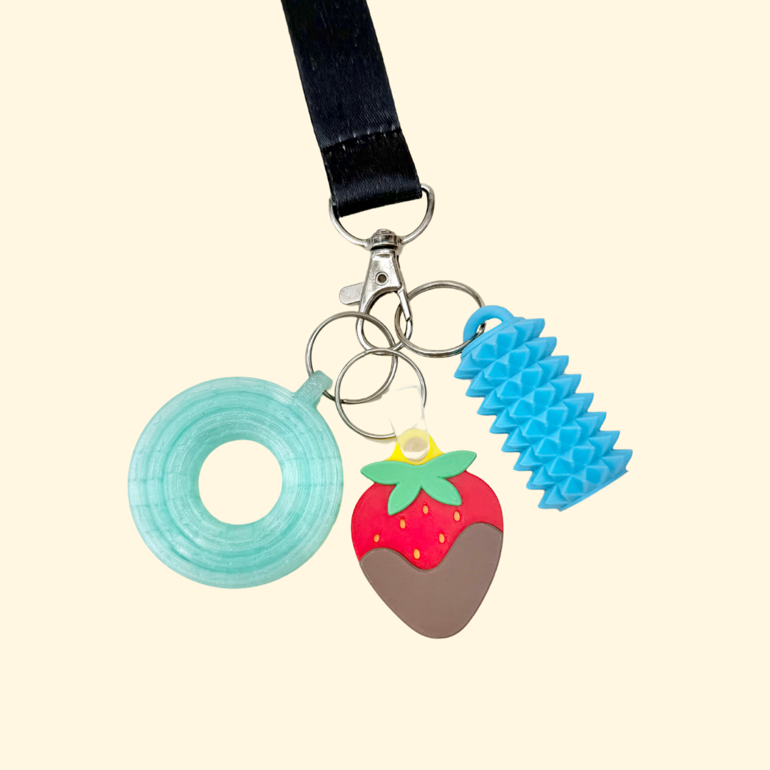 Tap-to-open NFC tag for lanyards and keyrings, programmed to call a number, open directions, or open a link.
