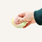 Unique sensory squishy with audible wax cracking and a soft clay-like feel after the crack for continued play.