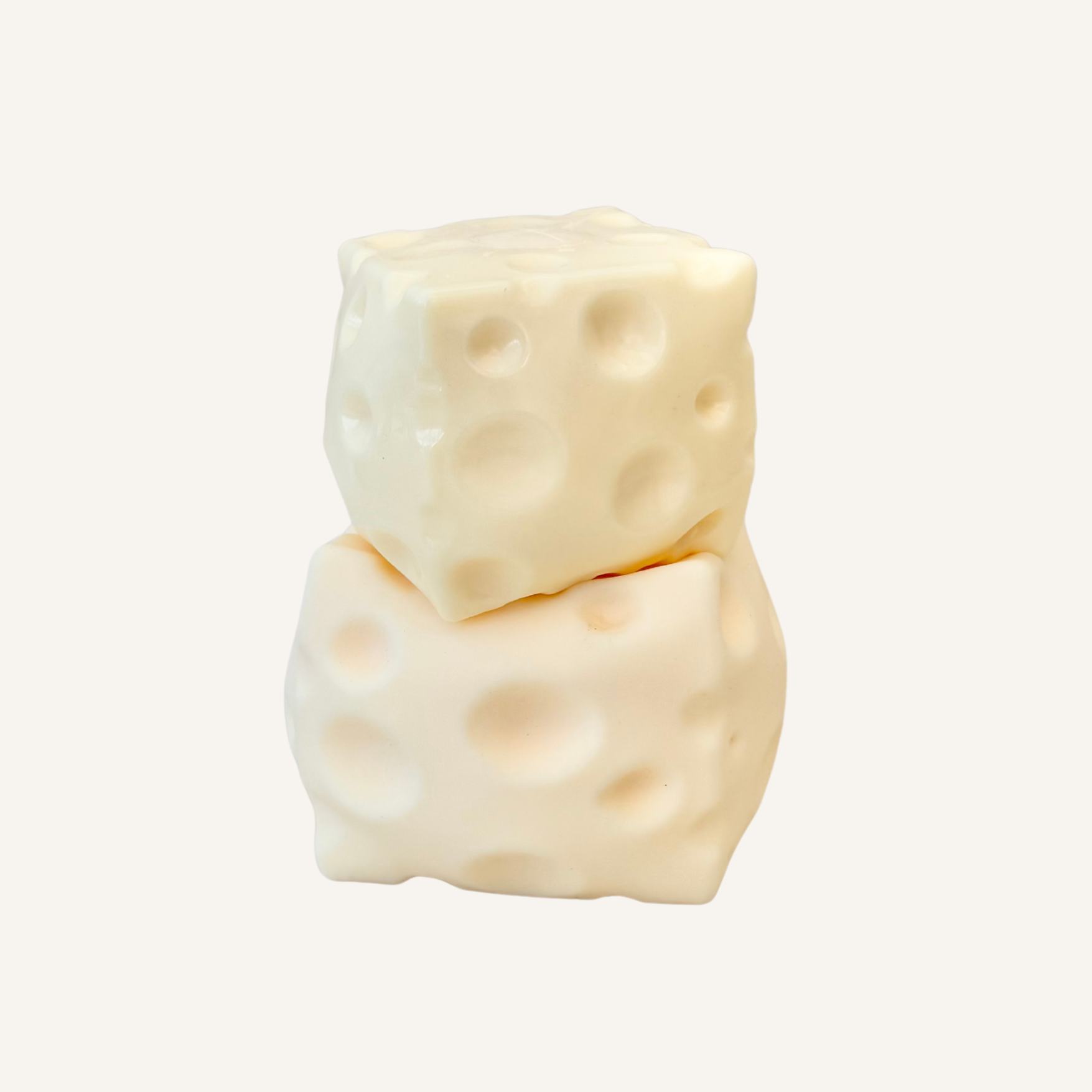 Grip-style cheese stress toy with a tacky finish and squishy, mouldable texture for hands-on calming.
