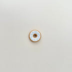 A smooth yet textured fidget toy with raised sprinkle details for added grip and a satisfying feel.
