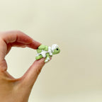 Rice-detailed turtle with egg topping and moving legs and head for tactile stimming.
