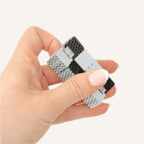 Compact textured FlexiCube designed for smooth repetitive movement and one-handed fidgeting.