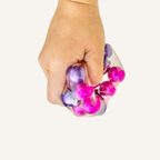 Squishy outer with firm beads inside for shifting tactile input, a satisfying fidget toy for focus and grounding.
