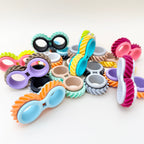 Small sensory fidget with textured rolling wheels for grounding, nervous energy and everyday regulation.