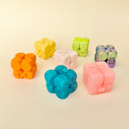Small tactile fidget cube with raised texture for extra grip, satisfying flips and quiet hands-busy movement.
