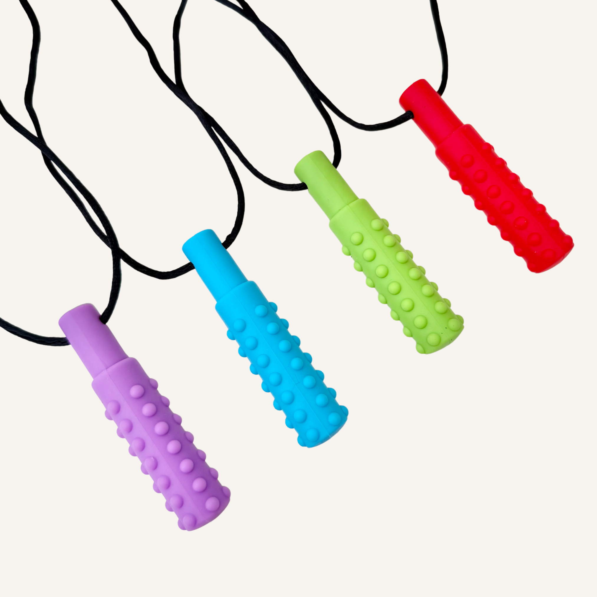 Silicone chew stim with a long textured shape for light chewing, oral sensory input and tactile fidget support.
