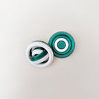 5 cm hand spinner with turbine-style ridges for thumb rolling and tactile input.
