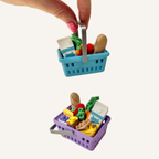 ALT
Mini grocery basket sensory clicker with realistic miniature groceries and four hidden clickers.