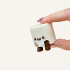 Small smiley collectable made for neuro-friendly workspaces, cosy corners and everyday display
