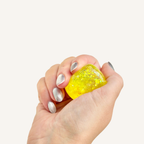 Small squishy fidget with raised details for thumb tracing, ideal for busy hands, grounding and quiet desk resets.
