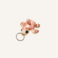 Articulated turtle lanyard attachment with tactile shell textures for tracing, gentle movement and on-the-go stimming.