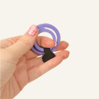 Sensory hand fidget with interconnected rings for satisfying twisting and flipping motion.