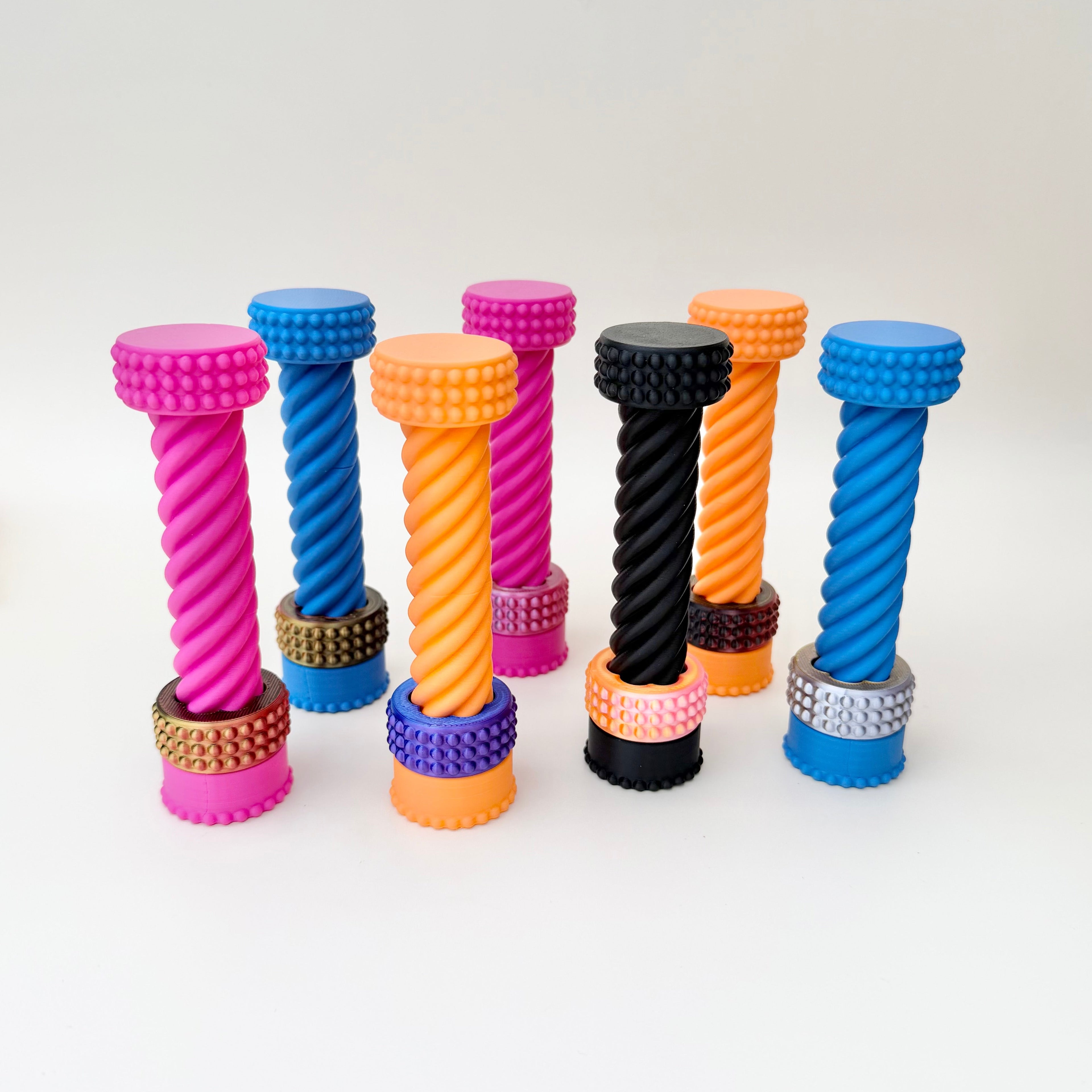 Handheld spiral fidget with a colour-changing ring that moves up and down when twisted.
