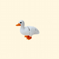 White duck fidget toy with orange beak and legs, black eyes, 8cm long and just under 6cm tall, designed for sensory play.