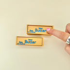 Butter-themed sensory clicker with double click action for focus support, stimming and regulation.