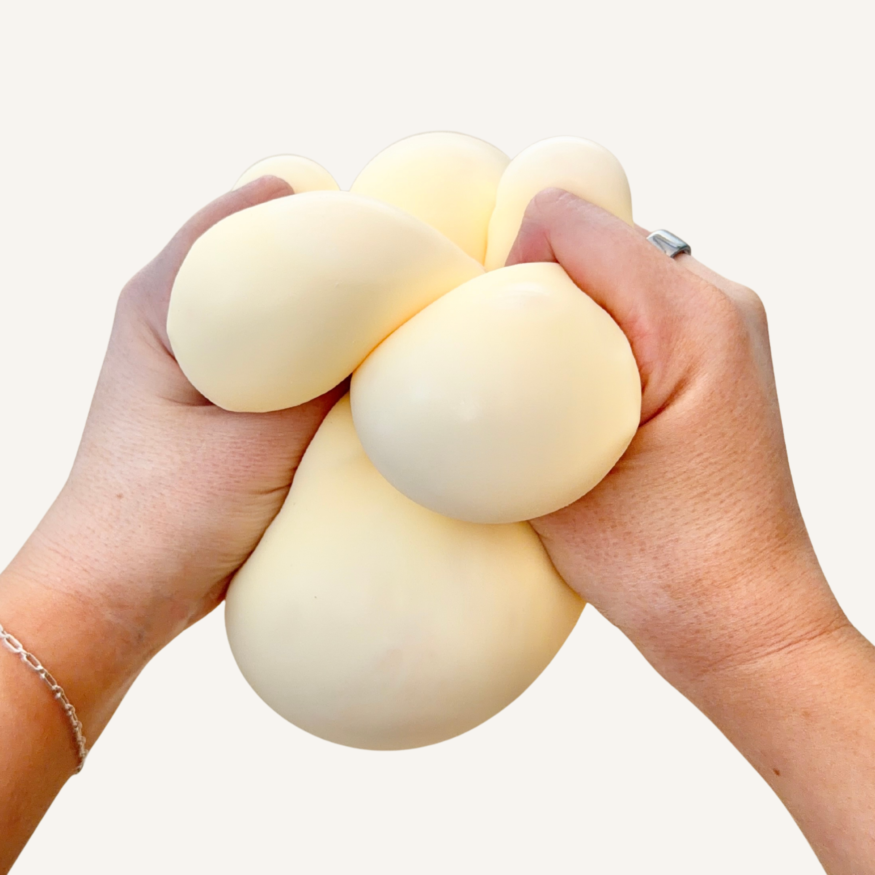 Chunky sensory squeeze toy with soft, pliable feel and comforting resistance for stress relief and fidgeting.