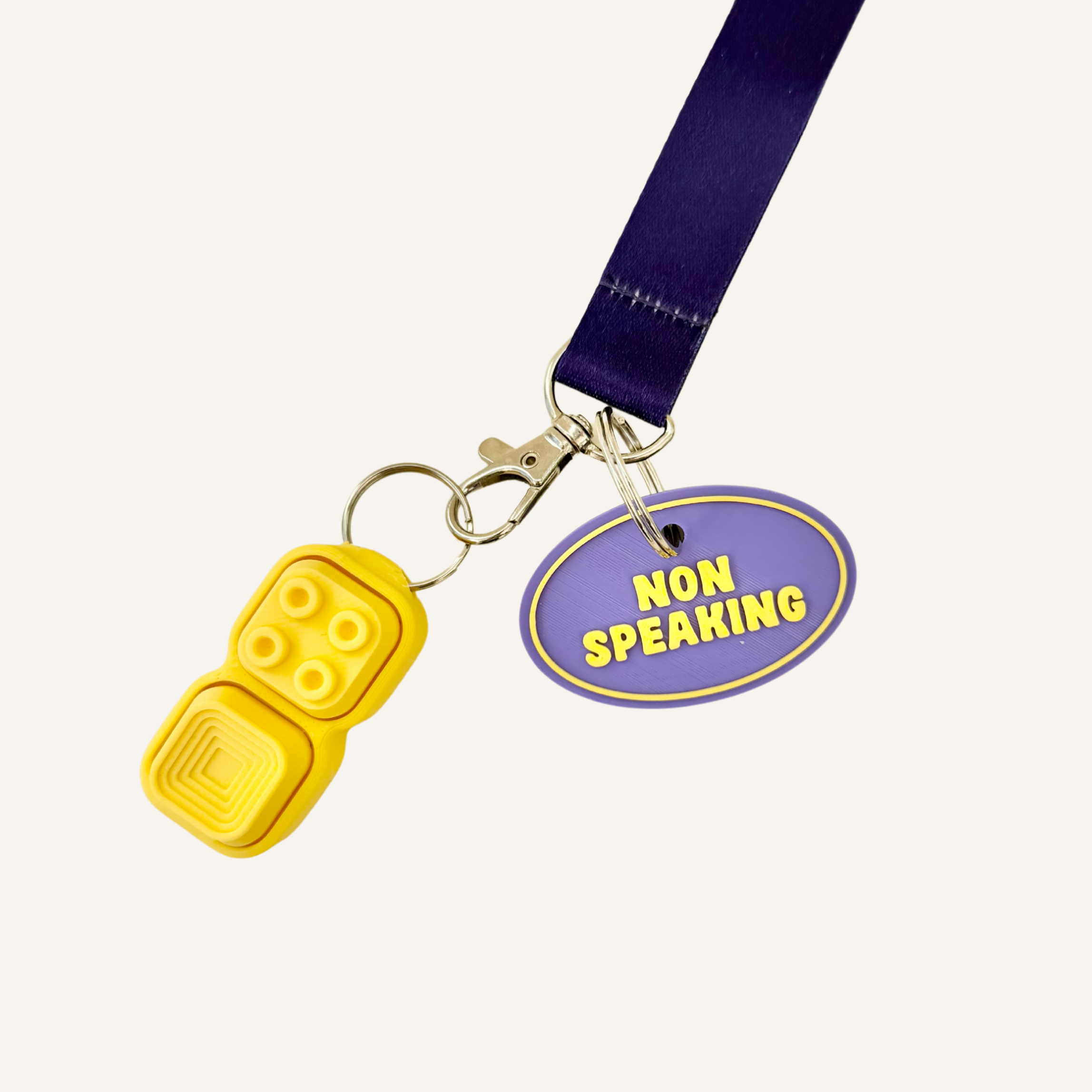 3D printed oval tag designed for simple, practical communication support.