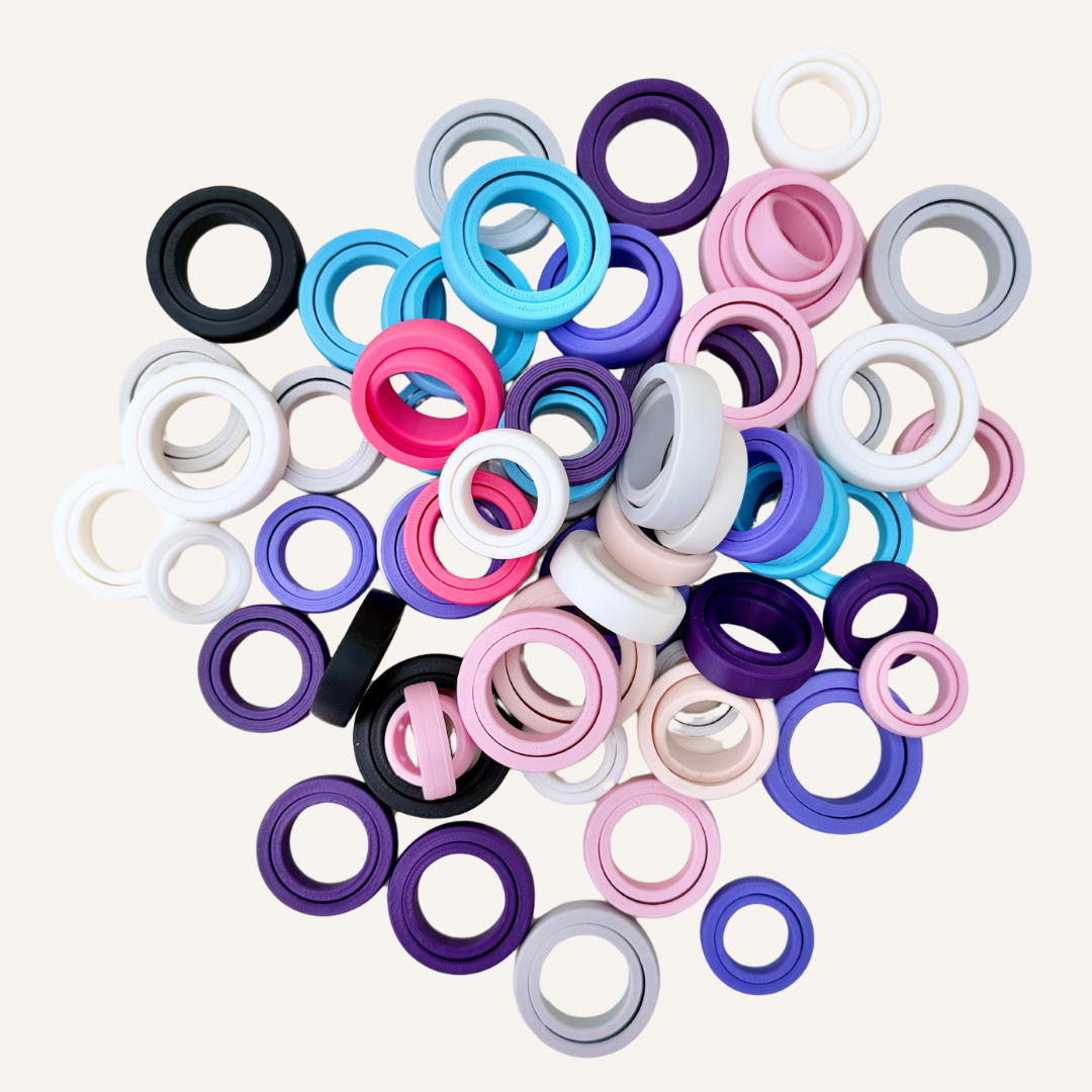 A small wearable fidget ring designed for quiet movement, focus and everyday sensory input