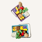 Mini grocery basket fidget with realistic food details, moving handle and four satisfying hidden clickers.
