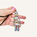 Flexible robot sensory fidget with wrist strap, colour-change finish and wiggly movement for busy hands.