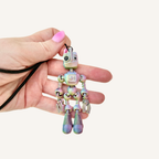 Flexible robot sensory fidget with wrist strap, colour-change finish and wiggly movement for busy hands.