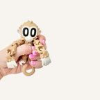 Articulated monkey fidget with tactile details, flexible movement and playful sensory feedback for regulation.
