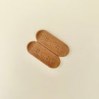 Tactile magnetic fidget with easy grip and natural wood-grain texture for focus, stress relief and stimming.

