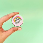 Colourful adult sensory clicker with tactile ridged edge and press down clicking action.