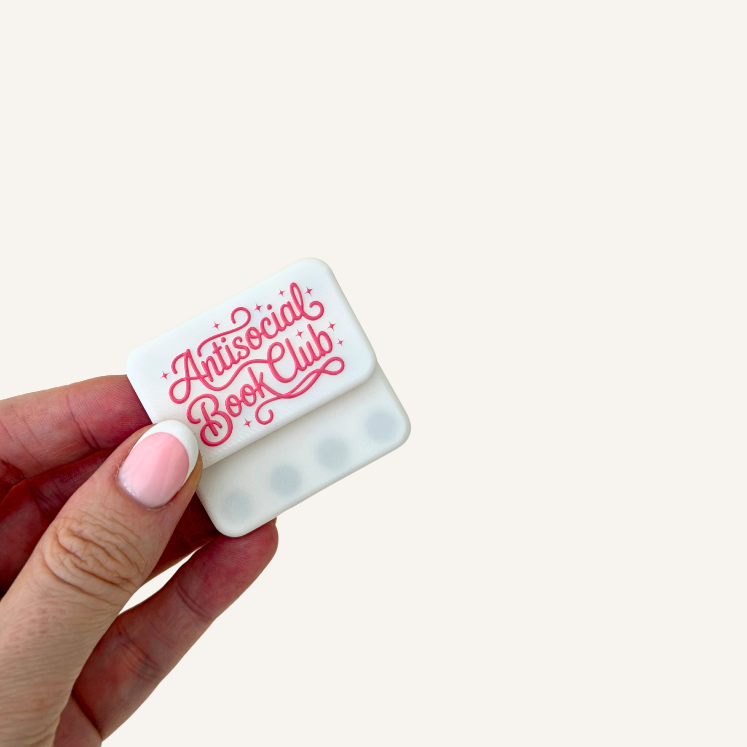 Compact white magnetic sensory fidgets sized for handheld, pocket and desk fidgeting.