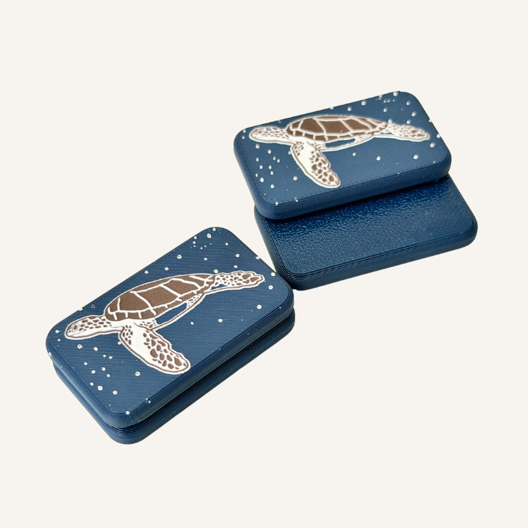 Pocket-sized magnetic sensory fidget with textured detailing for extra grip and repetitive hand movement.