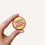Colourful handheld sensory clicker designed for book lovers with a choice of quiet or noisy click.