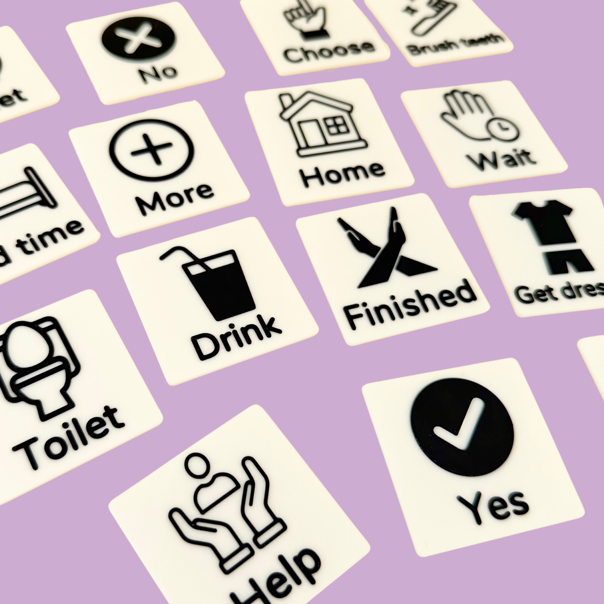 Stimz COMMZ Starter visuals including Yes, No, Help, Choose, More, Finished, Wait, Toilet, Drink, Food and everyday routines.