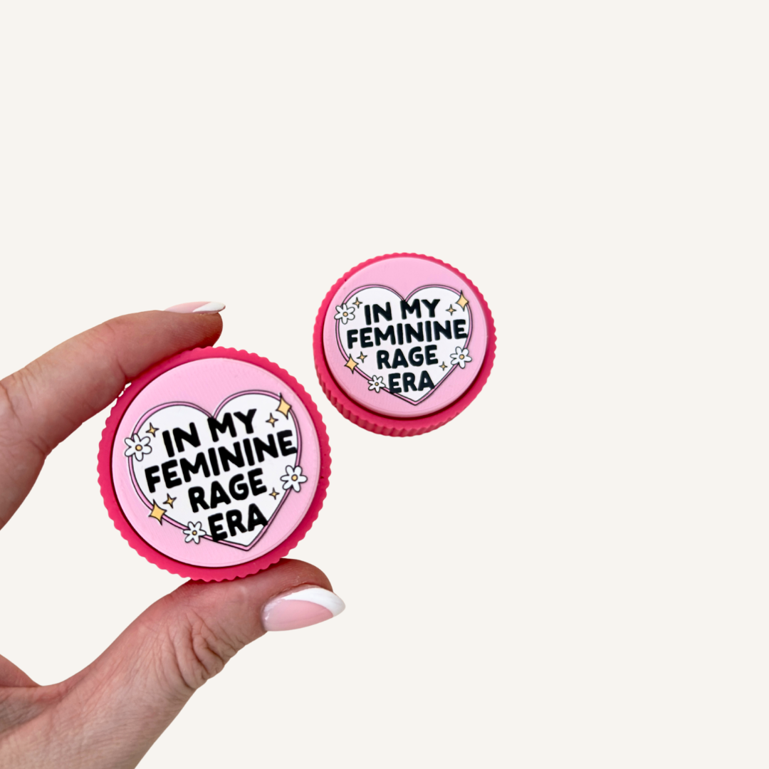 Pink Feminine Rage Clicker with floral heart artwork, a tactile sensory fidget and funny gift for adults.