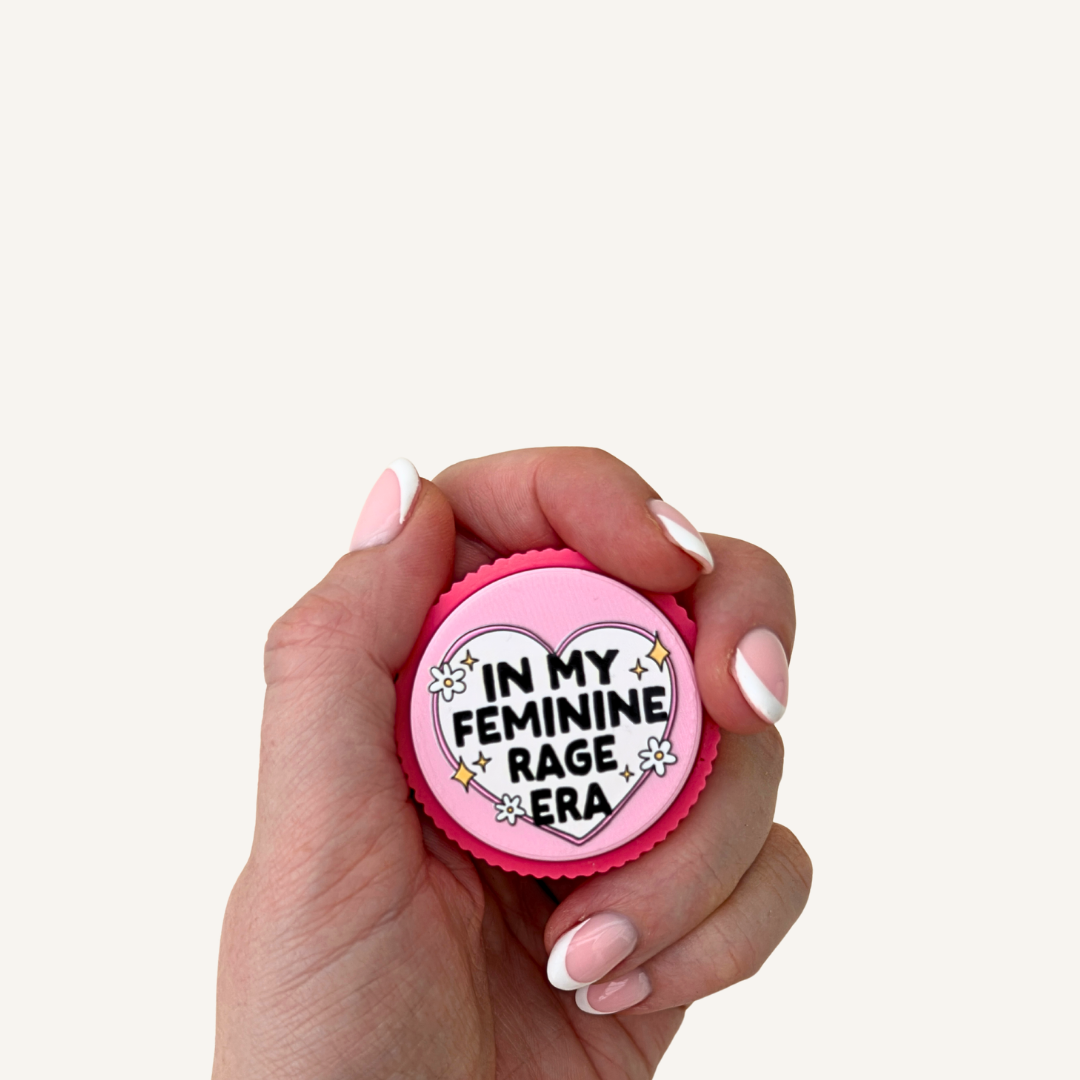 Pink Feminine Rage sensory clicker available with a choice of Quiet or Noisy Click.