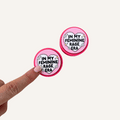 Feminine Rage sensory clicker with hot pink ridged base, pale pink top and raised tactile artwork.