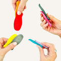 Magnetic Flip Decks sensory fidgets with skateboard-inspired shape and textured grip surface in mixed colours.