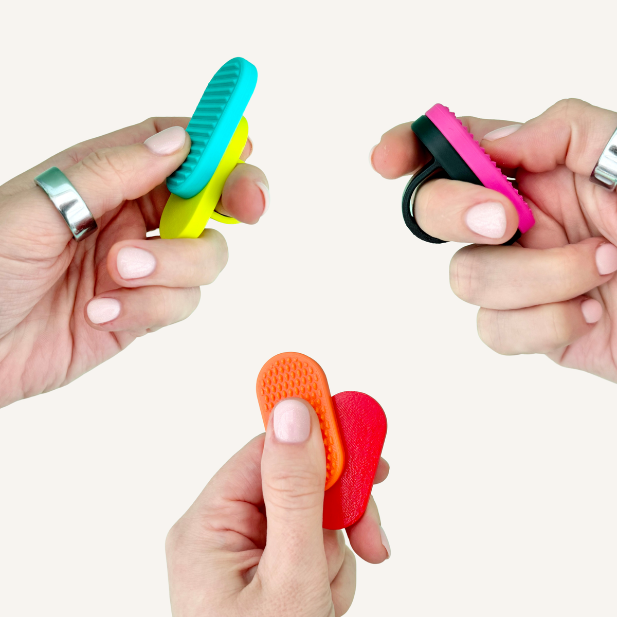 Magnetic Ring sensory fidget worn loosely around the finger with the textured magnet attached.