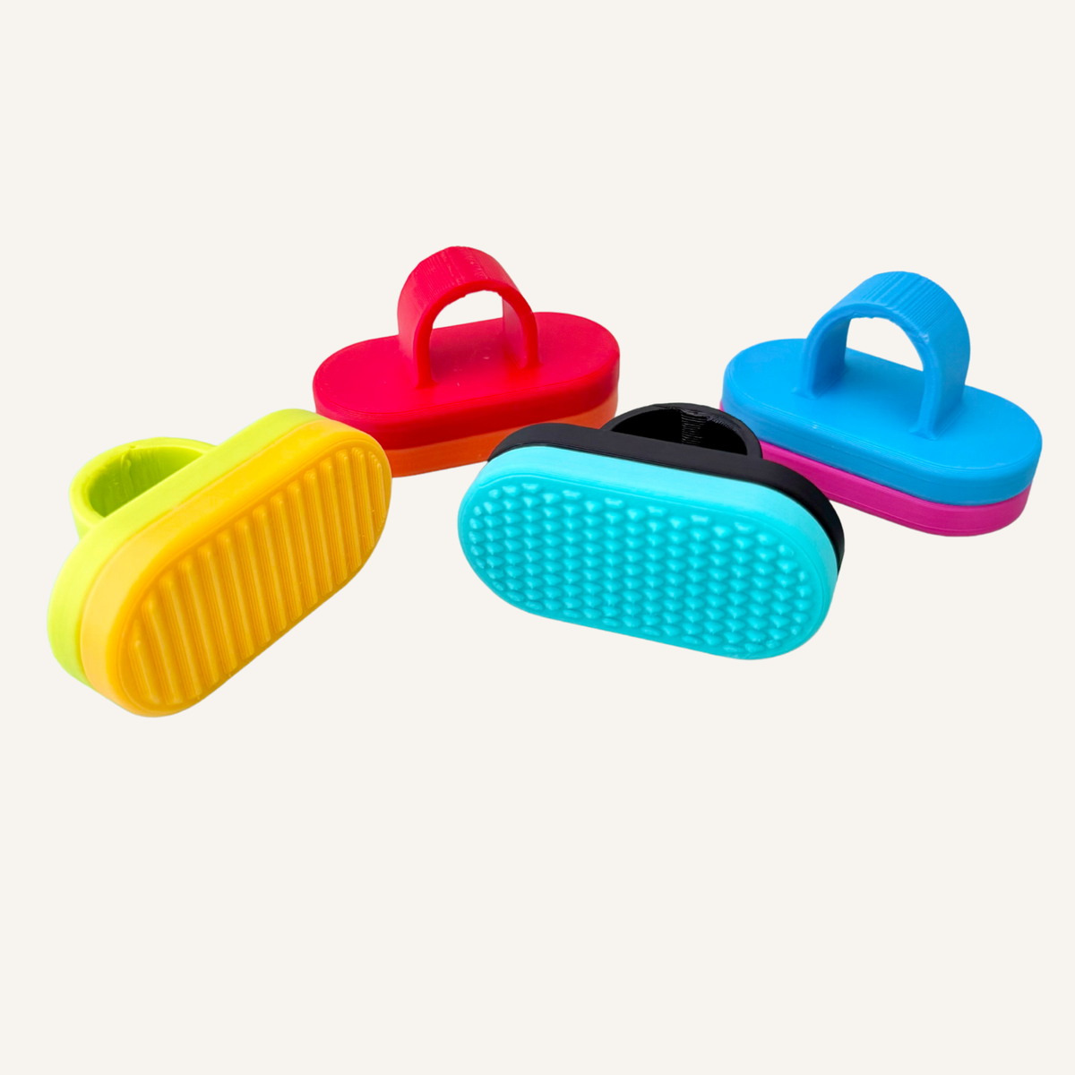 Selection of custom Magnetic Ring fidgets showing different colour and texture combinations.
