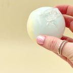 Wax crack sensory fidget that arrives protected in a capsule, with a fun crack-and-squish experience.