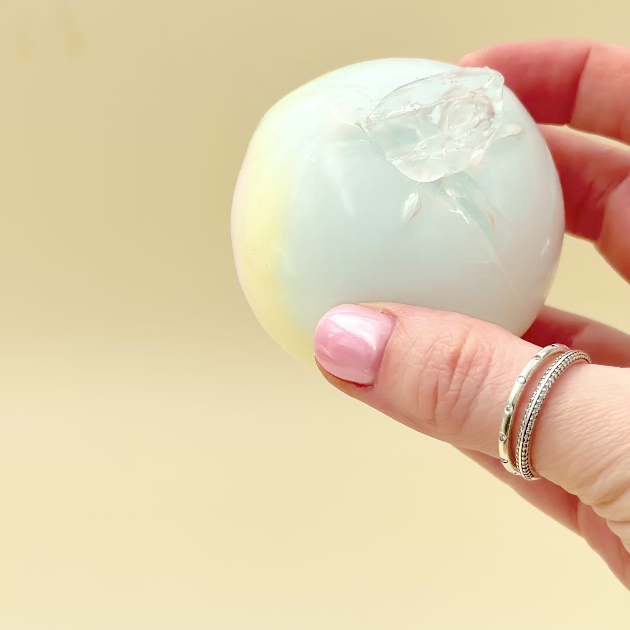 Wax crack sensory fidget that arrives protected in a capsule, with a fun crack-and-squish experience.