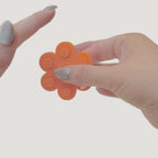 Compact sensory spinner fidget with pop-back centre for quick stims, travel fidgeting and calming hands.
