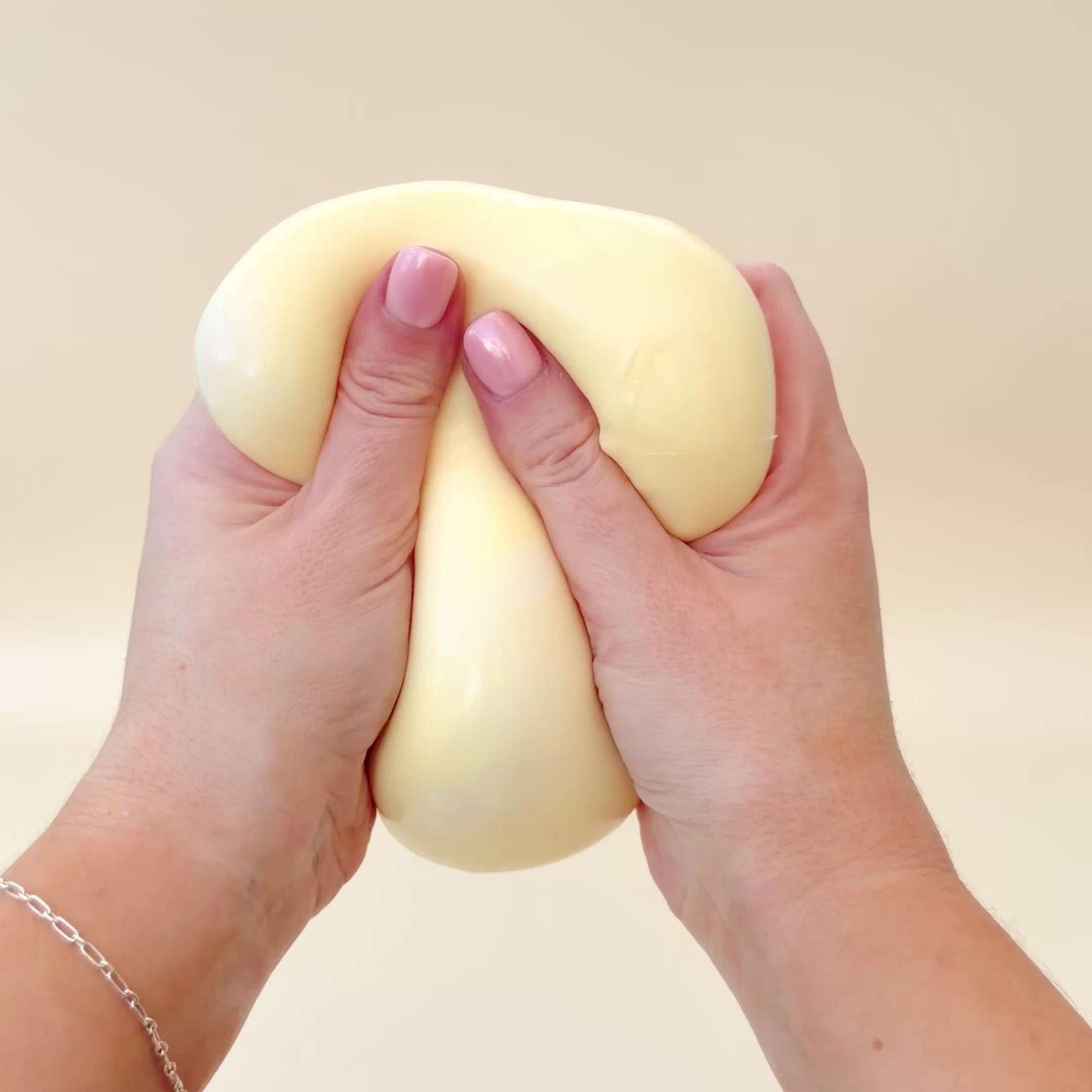 Shapeable squishy sensory toy for pressing and moulding, offering slow calming tactile input and grounding support.