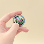 Petite fidget spinner featuring a full gyro spinning mechanism and colourful rainbow design.  Gyro Rainbow Fidget Spinner